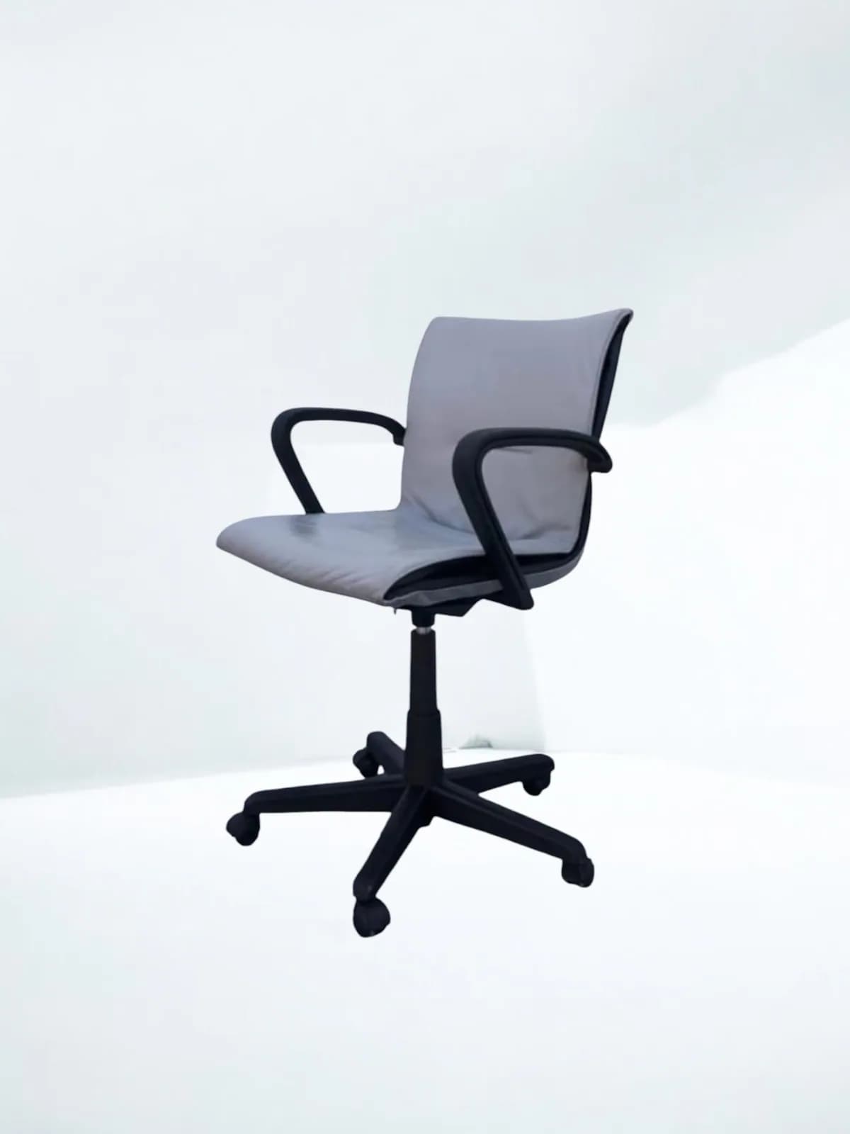 Chaise à roulette cuir TECNO Qualis Emilio Ambasz